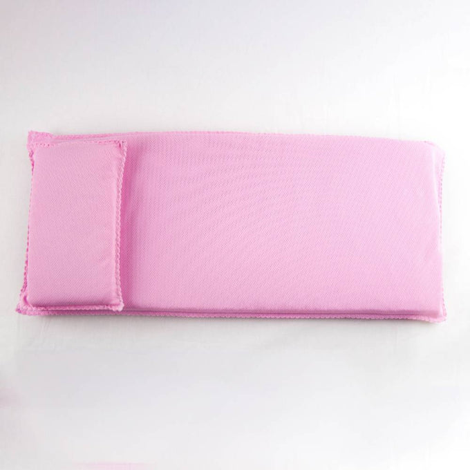 Handcrafted pink miniature bedding set with a pillow and mattress, designed for doll furniture, perfect for children's toys and Amish made collections.