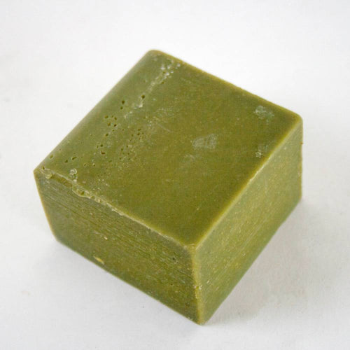 Handcrafted green soap bar with a smooth texture, made in USA, ideal for Health & Wellness, Grooming and Personal Hygiene, Soaps, and Best Sellers collections.