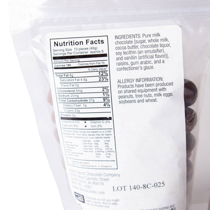 Back of resealable bag showing nutrition facts and ingredients for chocolate covered raisins, made in USA, featured in Kitchen & Food, Snacks and Sweets, Candy, USA Made, and Best Sellers collections.
