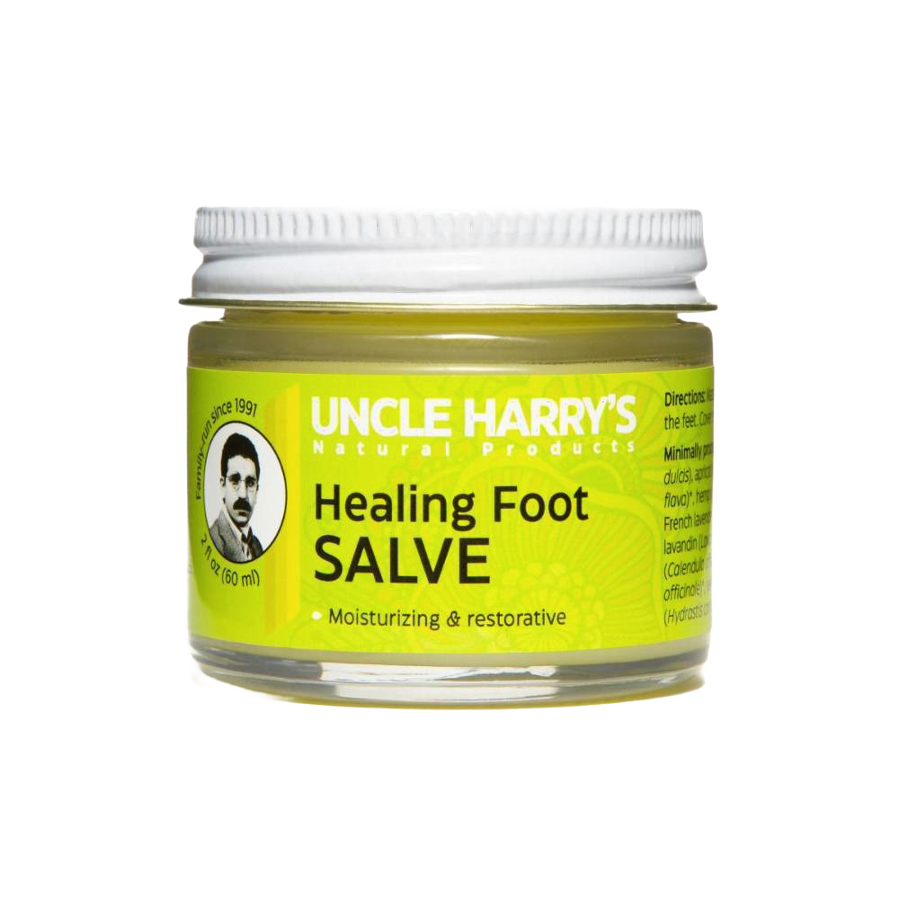 Small glass jar with white lid containing Uncle Harry's Healing Foot Salve, featuring a bright yellow label highlighting moisturizing and restorative benefits, USA made and ideal for Health & Wellness collections.