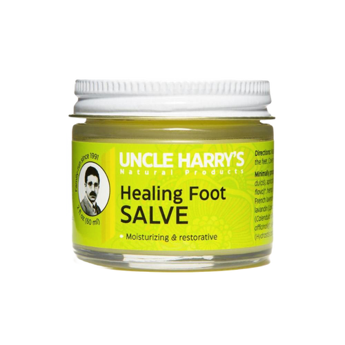Small glass jar with white lid containing Uncle Harry's Healing Foot Salve, featuring a bright yellow label highlighting moisturizing and restorative benefits, USA made and ideal for Health & Wellness collections.