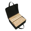 Compact black canvas storage bag opened to reveal a handcrafted wooden Kubb yard game set with king block, rectangular and knight blocks, and six throwing dowels, ideal for lawn games and outdoor family fun in Toys, Books & Games, Lawn Games, Best Sellers, and Promo Eligible collections.