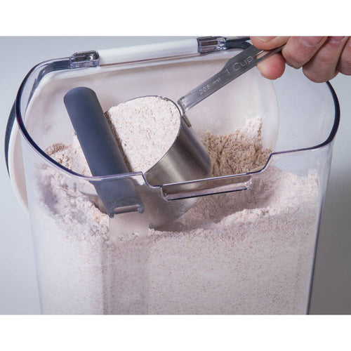 Clear plastic storage container holding flour with built-in leveler and a metal 1-cup measuring scoop, designed for freshness and organization in Kitchen & Food, Storage and Serving, Best Sellers, Promo Eligible collections.