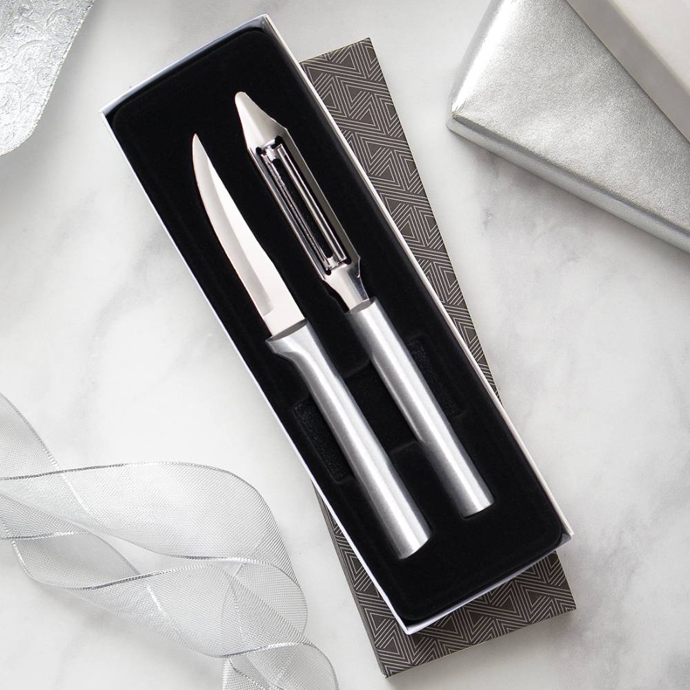 Two-piece kitchen set featuring a heavy-duty paring knife and sleek vegetable peeler with stainless steel handles, designed for efficient food prep, part of USA Made collections.