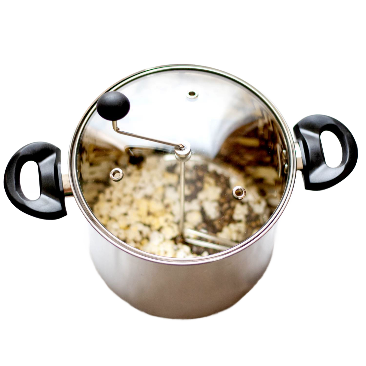 Stainless steel stovetop popcorn popper with glass lid and black handles, featuring a hand crank and visible popping kernels, ideal for Kitchen & Food and Cookware collections.