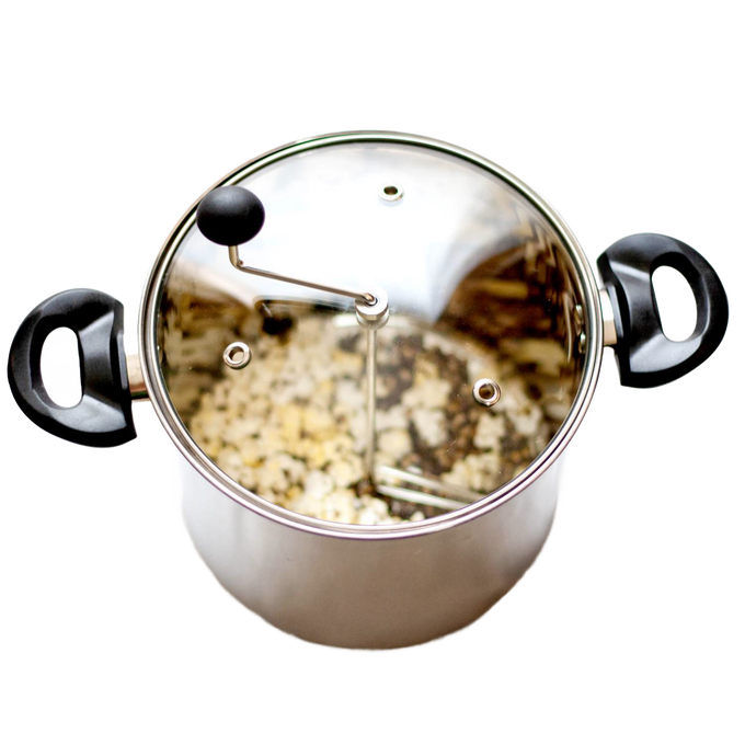 Stainless steel stovetop popcorn popper with glass lid and black handles, featuring a hand crank and visible popping kernels, ideal for Kitchen & Food and Cookware collections.