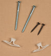 Two long silver screws, two shorter black screws, and two white plastic toggle anchors arranged on a beige background, suitable for home décor and laundry supply use.