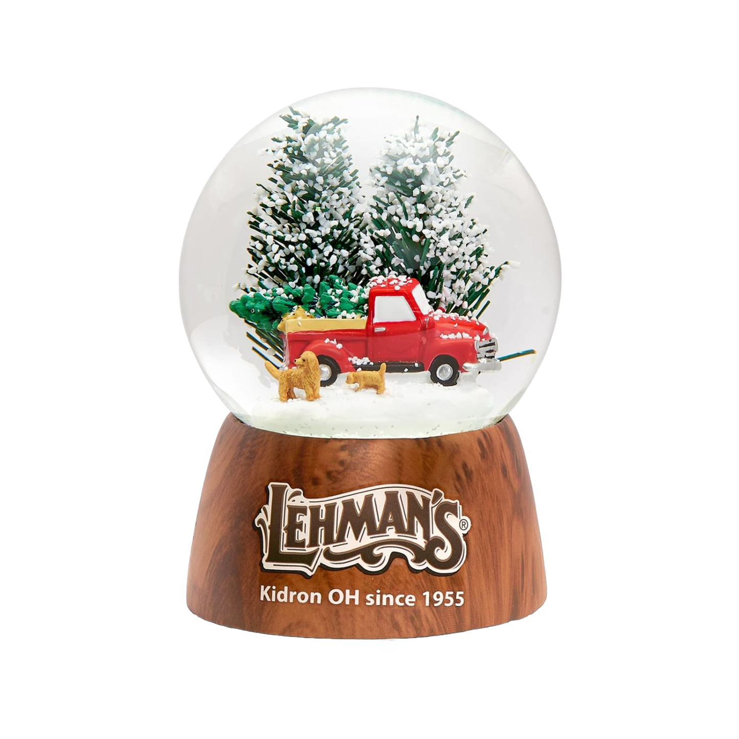 Handcrafted musical snow globe featuring a red vintage truck with a Christmas tree and two dogs, set among snowy pine trees, perfect for Home & Decor and Holiday Decor collections.