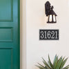 Handcrafted black and silver rectangular custom address plaque with bold numbers mounted on white stucco near a green door and vintage-style wall lantern, part of Home & Decor, Household Helpers, and Mailboxes and Address Signs collections.
