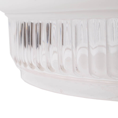 Close-up of a handcrafted white glass lamp shade with a fluted design, part of a classic oil lamp accessory collection featuring lamps and lighting components.