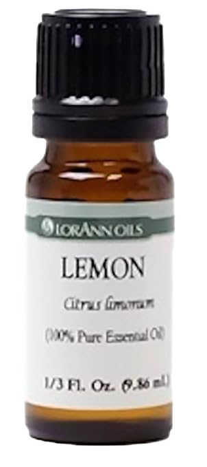 Small amber glass bottle with black cap containing handcrafted 100% pure lemon essential oil, ideal for Health & Wellness, Soapmaking, and Candlemaking uses.