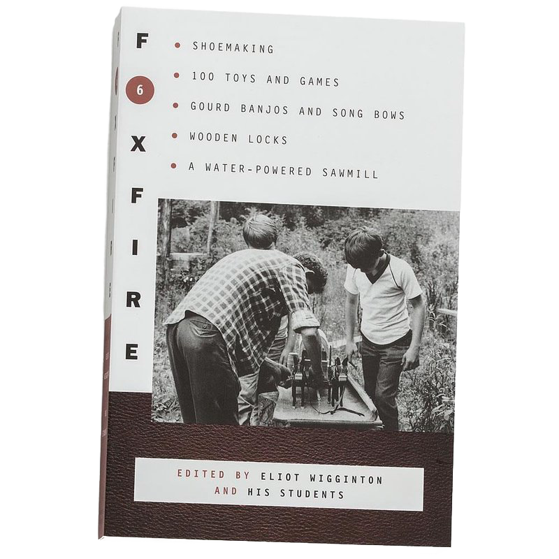 Paperback book cover for a heritage and lifestyle collection featuring Appalachian crafts, toys, and traditional skills with a vintage photo of people working outdoors.
