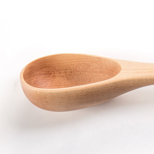 Close-up of a handcrafted solid American Hard Maple wooden spoon bowl, highlighting smooth grain and durable craftsmanship, perfect for Kitchen & Food, Holiday Hosting, USA Made collections.