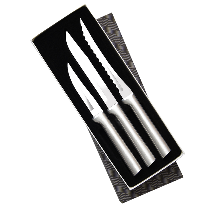 Set of three handcrafted stainless steel knives with sleek silver handles in a black velvet-lined gift box, designed for food prep and kitchen use, made in USA collections.