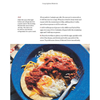 Close-up of a plated breakfast dish with eggs, shredded cheese, and red sauce on corn tortillas, featured in the Best Sellers and Cookbooks collections suitable for Toys, Books & Games.