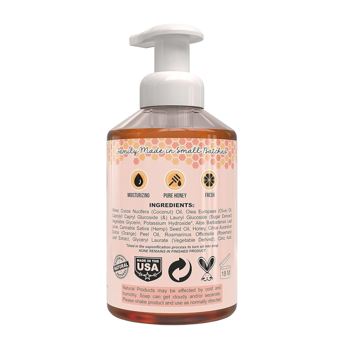 Back view of a 16 fl oz clear pump bottle with natural foaming hand soap made in small batches in the USA, highlighting moisturizing honey and fresh ingredients, ideal for Health & Wellness and Soaps collections.
