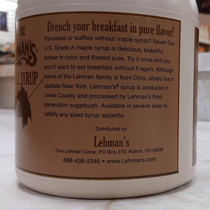 Close-up of a beige container label describing handcrafted U.S. Grade A medium amber maple syrup made in USA, featured in Kitchen & Food, Food, Pantry, USA Made, Best Sellers, and Promo Eligible collections.