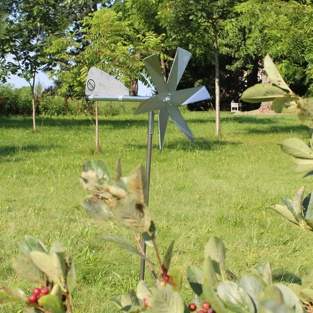 Handcrafted Amish made mole deterrent windmill with shiny metal blades mounted on a slender post, designed for humane pest control in Farm, Garden & Tool, Lawncare, Pest Control, Best Sellers, and Promo Eligible collections.