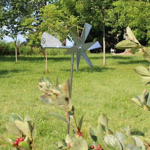 Handcrafted Amish made mole deterrent windmill with shiny metal blades mounted on a slender post, designed for humane pest control in Farm, Garden & Tool, Lawncare, Pest Control, Best Sellers, and Promo Eligible collections.