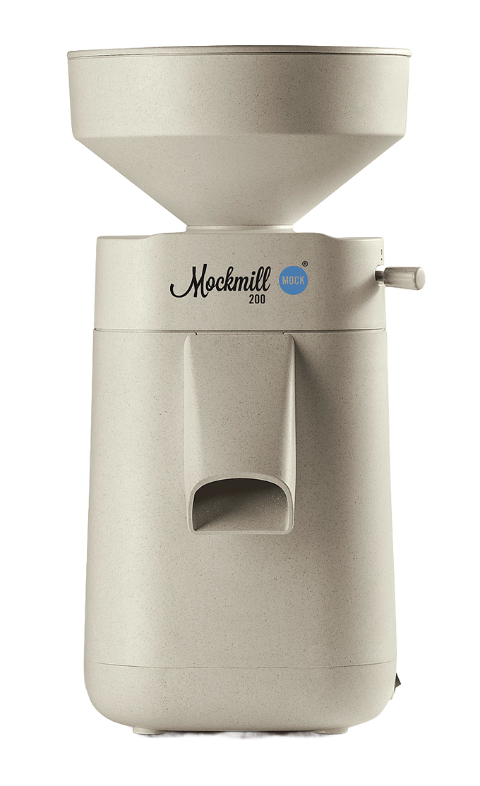 Electric stone grain mill in a smooth beige finish with a wide hopper and compact design, part of Kitchen & Food, Grain Mills, Best Sellers, and New collections.