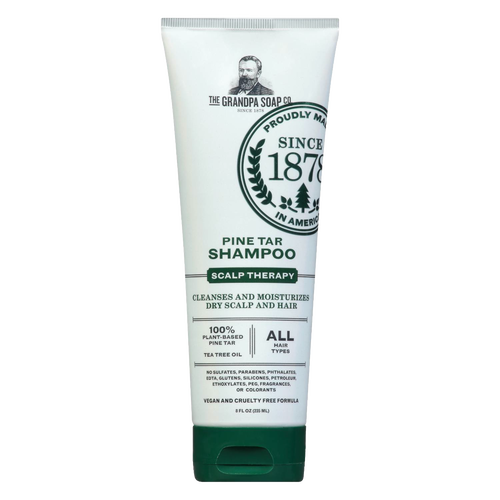 Tube of handcrafted pine tar shampoo with tea tree oil, designed to cleanse and moisturize dry scalp and hair, suitable for all hair types, part of Health & Wellness and Grooming collections.