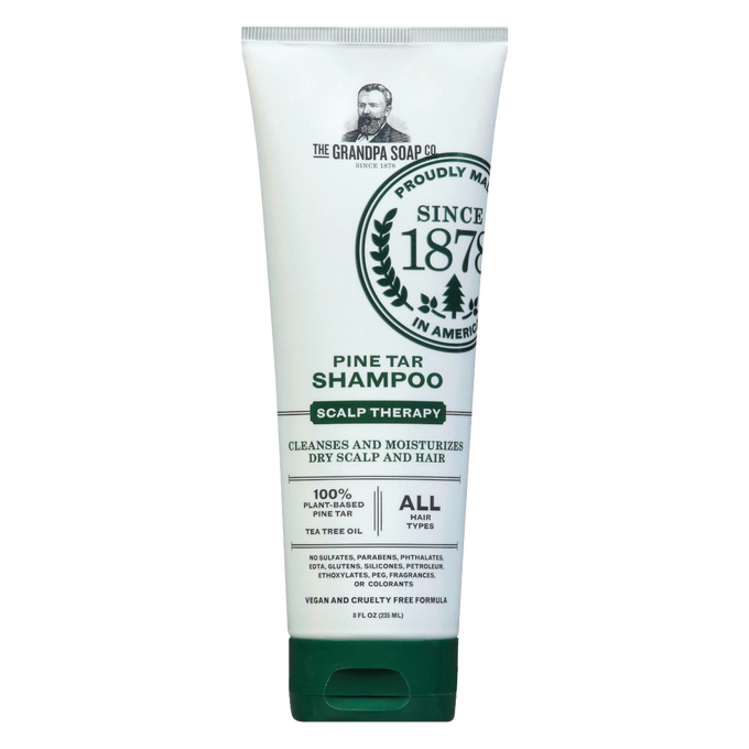 Tube of handcrafted pine tar shampoo with tea tree oil, designed to cleanse and moisturize dry scalp and hair, suitable for all hair types, part of Health & Wellness and Grooming collections.