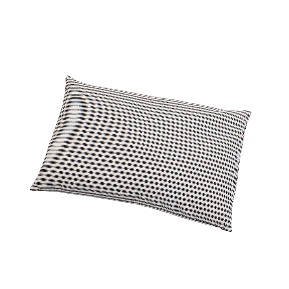 Handcrafted buckwheat bed pillow with a striped fabric cover, offering adjustable firmness and natural support, made in the USA, part of Home & Decor and Best Sellers collections.
