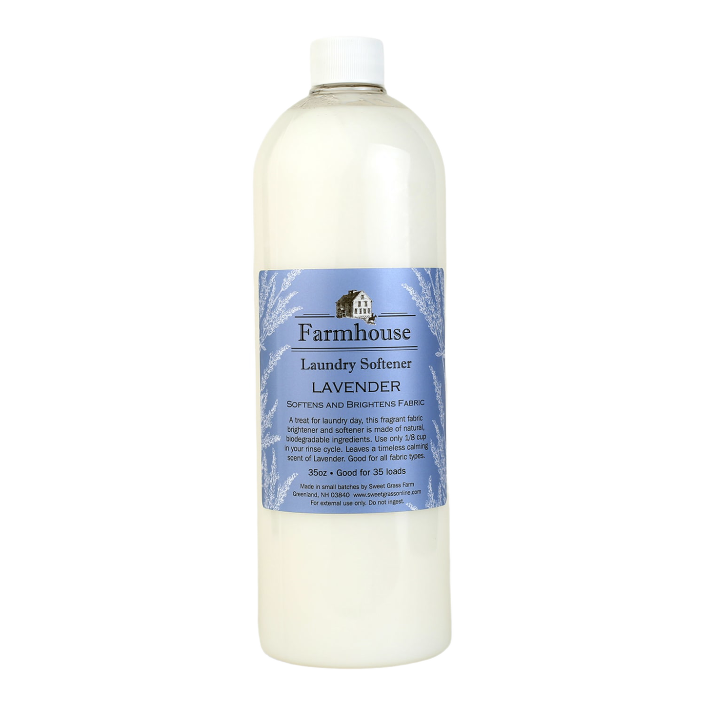Tall translucent bottle of lavender-scented fabric softener with a blue label featuring a farmhouse illustration, part of USA made laundry supplies and best sellers collections.