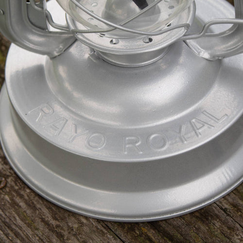 Close-up of a handcrafted silver metal lantern base embossed with "Rayo Royal," part of the Farm, Garden & Tool, Camping, and Emergency Supplies collections.