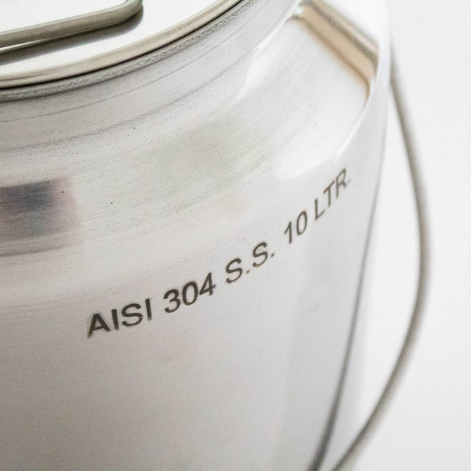Close-up of a 10-liter capacity small stainless steel milk can made from shining 304 grade seamless steel, featuring a sturdy handle and smooth finish, ideal for farm and animal care use.