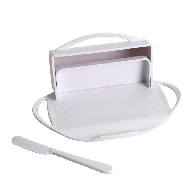 White flip-top butter dish featuring a built-in spreader cradle and matching spreader, designed for tidy butter storage and easy spreading in Kitchen & Food and Kitchen Accessories collections.