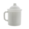 Opaque white ceramic measuring cup with handle and lid, featuring embossed measurement markings, designed for precise food preparation in kitchen and baking collections.