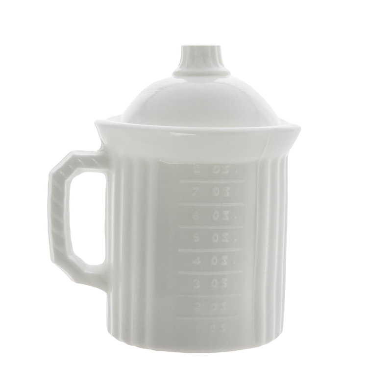 Opaque white ceramic measuring cup with handle and lid, featuring embossed measurement markings, designed for precise food preparation in kitchen and baking collections.