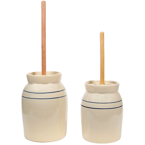 Pair of handcrafted stoneware butter churns in natural stone color with smooth unfinished wooden dashers and traditional double blue stripes, made in USA, featured in Kitchen & Food, Specialty Equipment, Making Butter, USA Made, Best Sellers, and Promo Eligible collections.