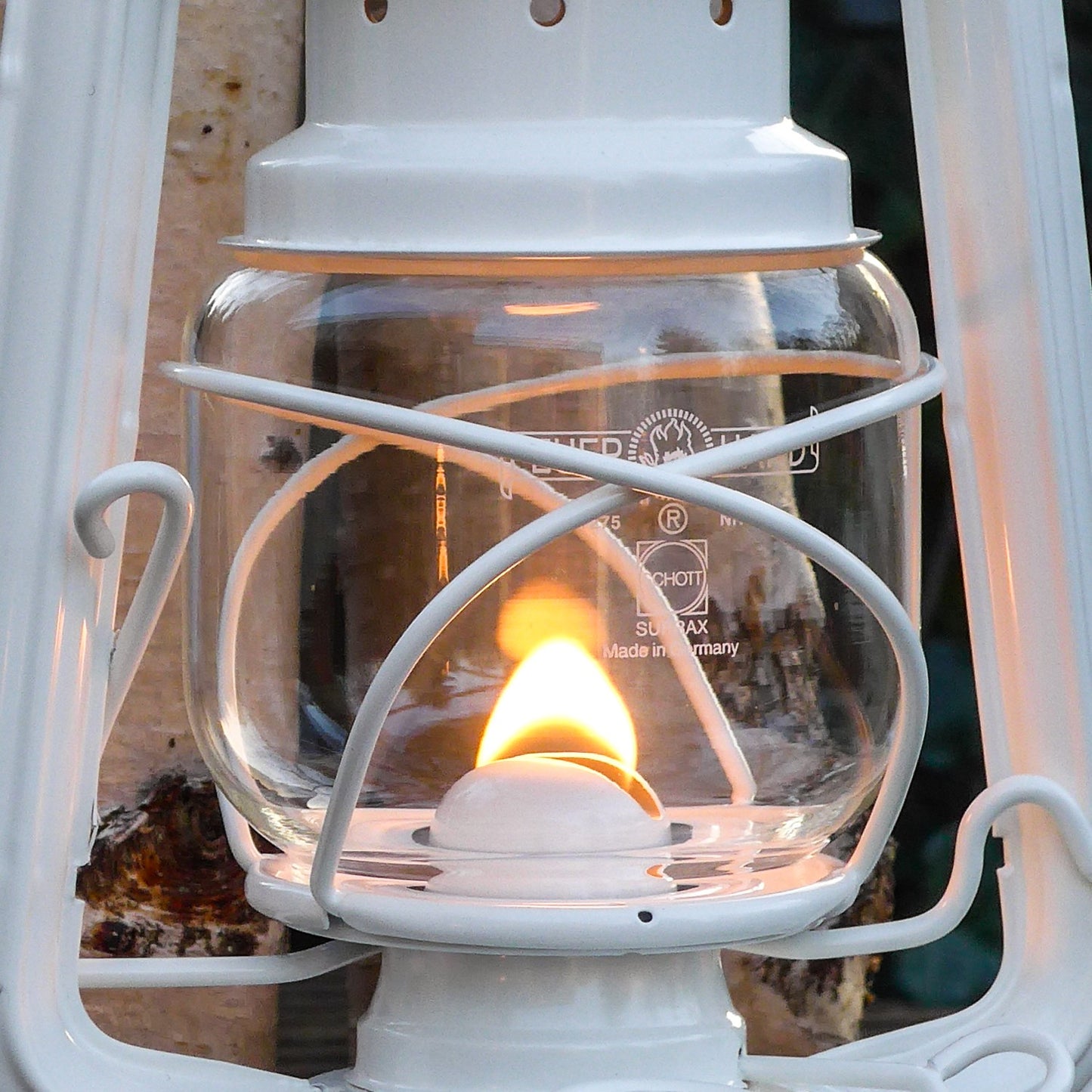 Clear glass replacement globe housing a visible flame, designed for lanterns in Camping, Emergency Supplies, and Lamps & Lighting collections with durable German glass.