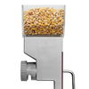 Handcrafted compact grain mill with stainless steel body and clear hopper filled with dry corn kernels, designed for adjustable grinding, featured in Kitchen & Food, Grain Mills, and Best Sellers collections.