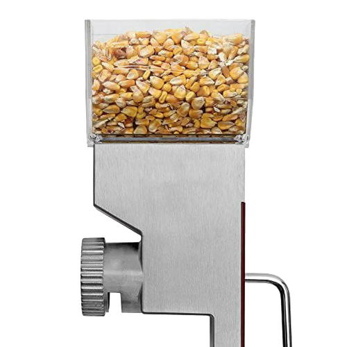 Handcrafted compact grain mill with stainless steel body and clear hopper filled with dry corn kernels, designed for adjustable grinding, featured in Kitchen & Food, Grain Mills, and Best Sellers collections.