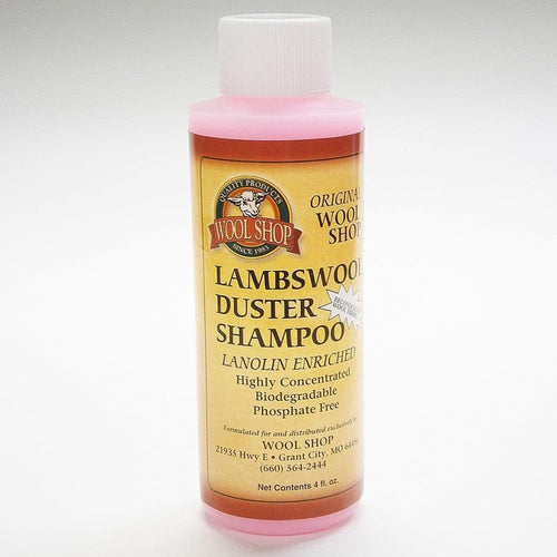 Plastic bottle of lanolin-enriched lambswool duster shampoo in pink liquid, biodegradable and phosphate-free, featured in Home & Decor and Household Cleaning collections.