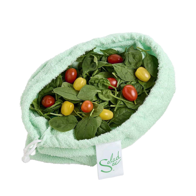Light green super absorbent fabric bag filled with fresh spinach leaves and red and yellow cherry tomatoes, designed for crisp vegetable storage in Kitchen & Food and Storage collections.