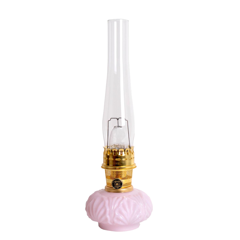 Handcrafted limited edition oil lamp with pastel pink Tuscan glass base, tall clear chimney, and bright metal burner, perfect for Lamps & Lighting, Oil Lamps, Table Lamps, and Best Sellers collections.