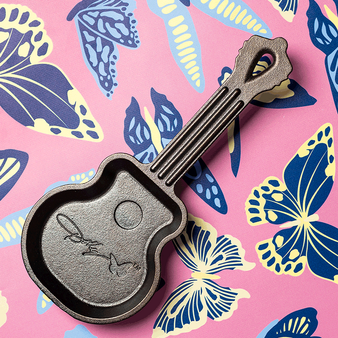 Handcrafted cast iron mini skillet shaped like a guitar with an embossed signature design, made in USA, perfect for Kitchen & Food, Cookware, Cast Iron, USA Made, Best Sellers, and Promo Eligible collections.