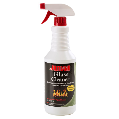 White spray bottle with red trigger containing non-toxic cleaner for removing soot and creosote from fireplace and wood stove glass, featured in Stoves and Hearth Accessories collections.