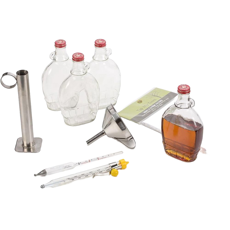Maple syrup processing kit featuring clear glass bottling flasks with red caps, stainless steel hydrometer test cup, candy thermometers, funnel, and a sugar guide, ideal for orchard and farm use.
