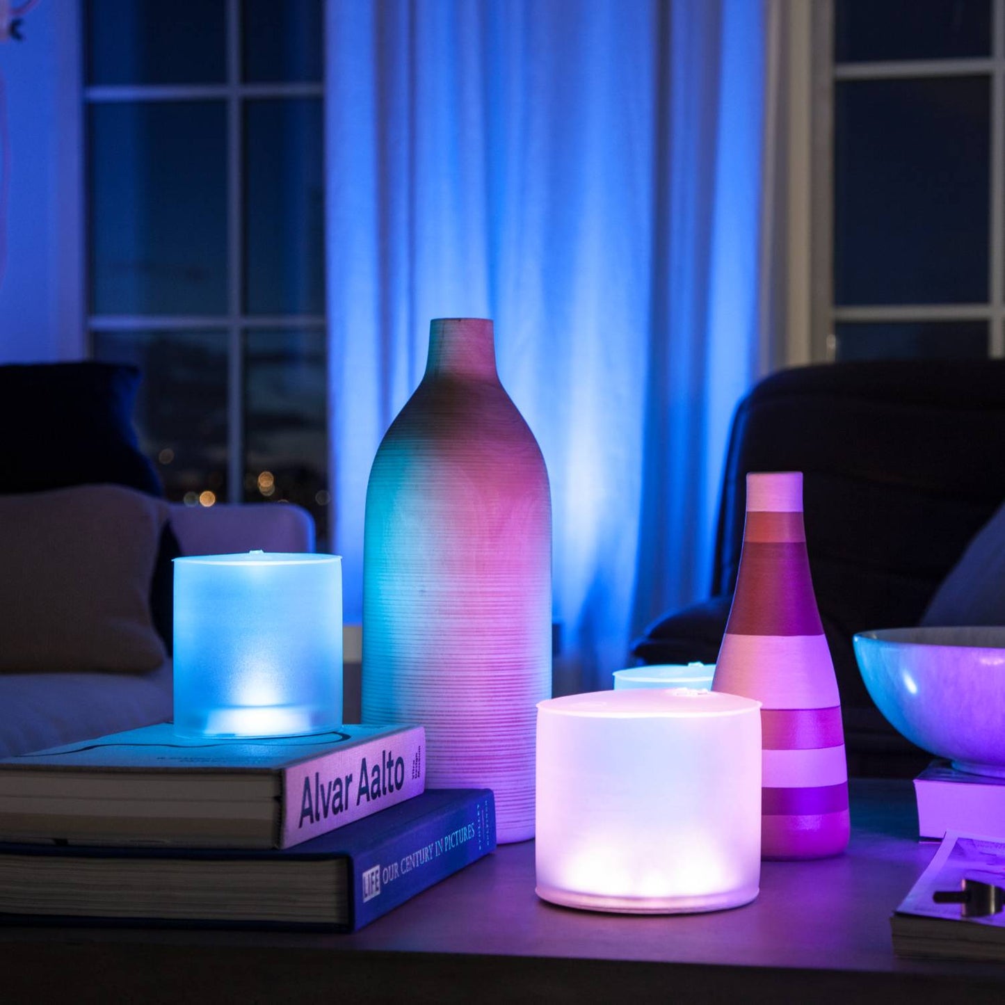 Soft glowing handcrafted Luci Color Essence solar lights in calming blues and purples, creating cozy ambient illumination for indoor Farm, Garden & Tool, Camping, and Lamps & Lighting spaces.