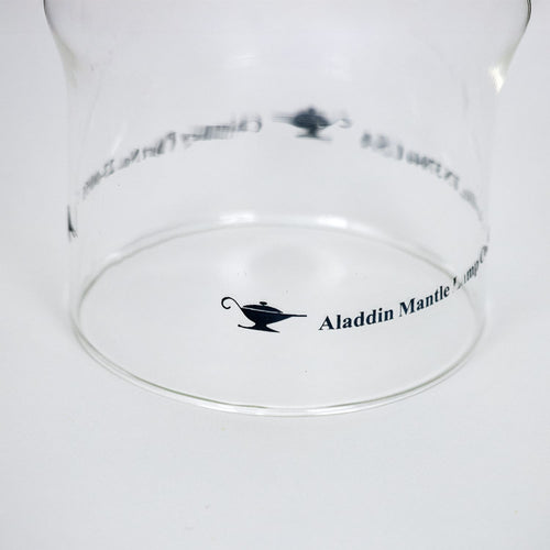 Clear glass chimney with Aladdin Mantle logo printed on the side, designed for use with lamps, lighting parts, chimneys, and best seller collections.
