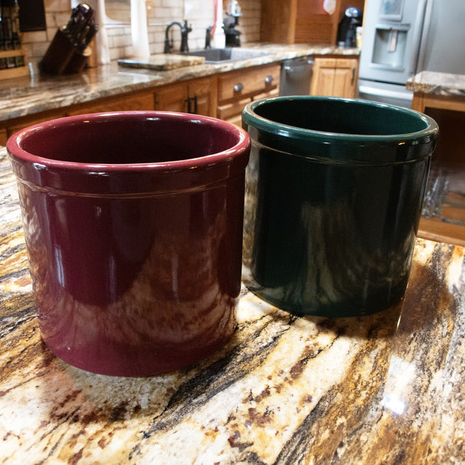 Pair of handcrafted 2-gallon stoneware crocks in rich red and deep green with smooth, lead-free, food-safe glaze, perfect for Kitchen & Food, Food Preservation, and USA Made collections.