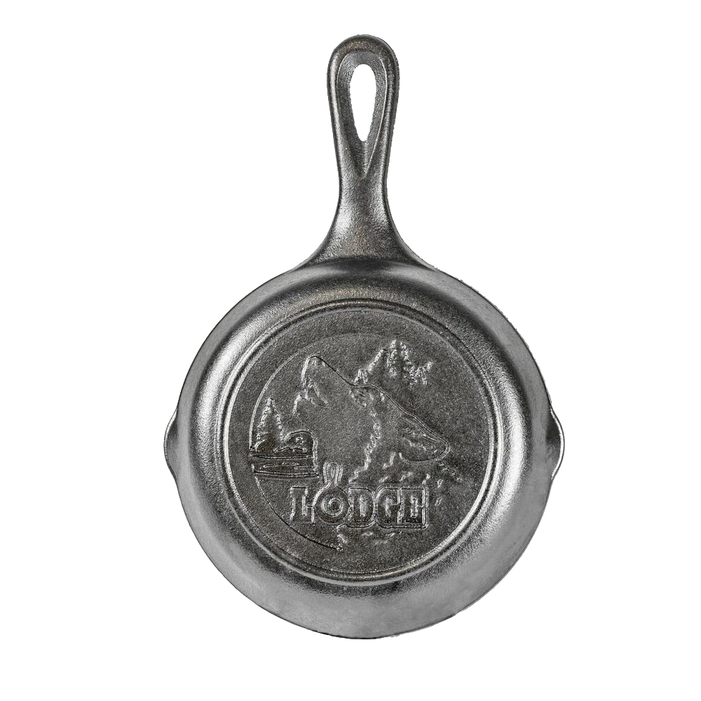 Small cast iron skillet featuring a raised wolf and mountain design, handcrafted in the USA, ideal for Kitchen & Food, Cast Iron, Cookware, and Best Sellers collections.
