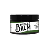 Small 4-ounce container of natural muscle balm with black lid and white label featuring bold text and green accents, part of Health & Wellness, Balms, Creams and Lotions, Health Remedies, USA Made, Best Sellers, and Promo Eligible collections.