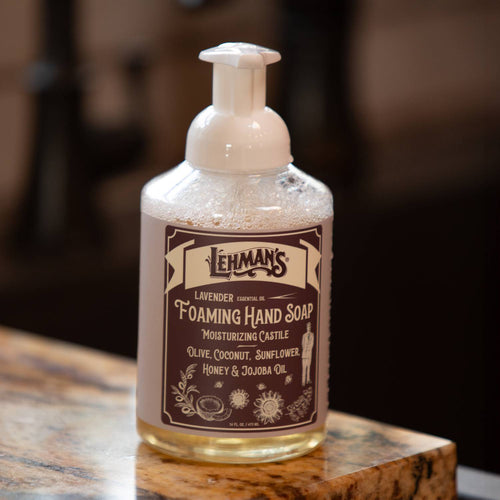 Clear pump bottle of handcrafted moisturizing foaming hand soap with lavender essential oil, made in USA with natural castile formula including olive, coconut, sunflower, honey, and jojoba oils, ideal for Health & Wellness, Grooming and Personal Hygiene, Soaps and Soapmaking, and Best Sellers collections.
