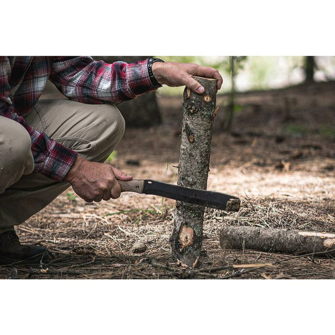 Man using a heavy-duty woodworking tool with a 5160 steel blade and ergonomic handle to split a log outdoors, featured in Farm, Garden & Tool, Camping, and Wood Cutting and Hauling collections.